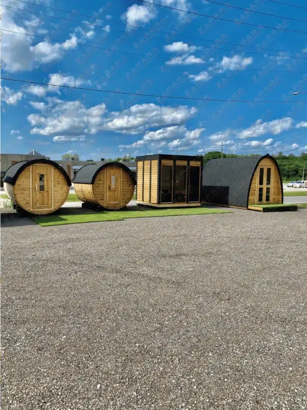 Eco Modern Outdoor Sauna Kit, outdoor display with several sauna styles