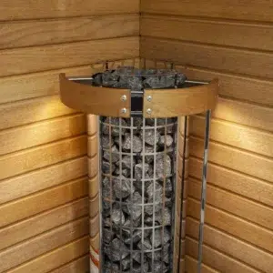 Harvia Cilindro electric sauna heater, installed in a sauna corner with safety railing