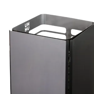 HUUM steel sauna heater reflector, installed along the side of a sauna heater