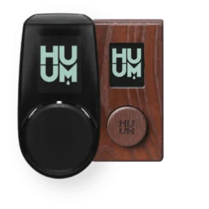 HUUM UKU sauna control panel, black and wood-finish control panels side by side