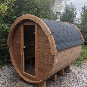 Outdoor barrel sauna, exterior with glass entrance door