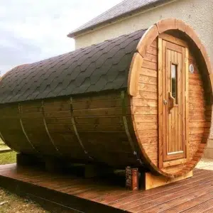 Outdoor barrel sauna, exterior on a wooden deck