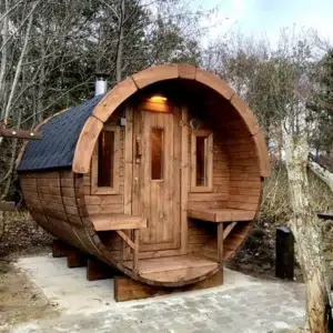 Outdoor barrel sauna, front entrance with porch benches