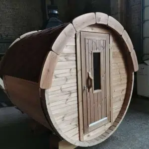 Outdoor barrel sauna, front exterior with glazed entrance door