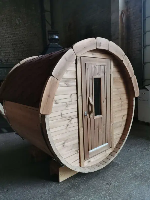 Outdoor barrel sauna, front exterior with glazed entrance door