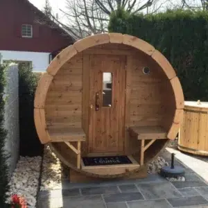 Outdoor barrel sauna, front porch with benches and central entrance
