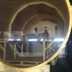Outdoor barrel sauna, full circular window viewed from outside