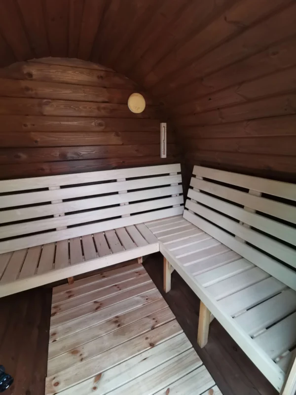 Outdoor barrel sauna, interior corner benches with backrests