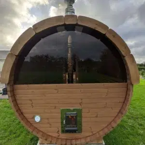 Outdoor barrel sauna, rear exterior with semicircular panoramic window