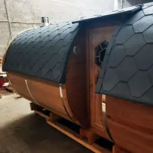 Outdoor barrel sauna, side entrance beneath the roof