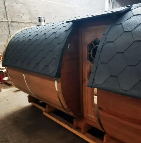 Outdoor barrel sauna, side entrance beneath the roof