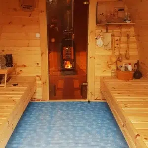 Outdoor pod sauna, changing area with opposing benches