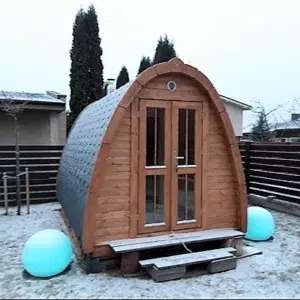Outdoor pod sauna, front exterior with glazed double doors