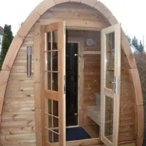 Outdoor pod sauna, open double doors revealing the interior