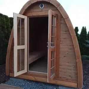 Outdoor pod sauna, open double doors showing wooden interior