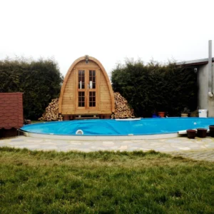 Outdoor pod sauna, wide view of poolside sauna installation