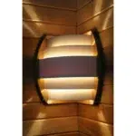 TESLI Sydney Corner sauna light cover with thermo wood base, illuminated cover installed in a sauna corner