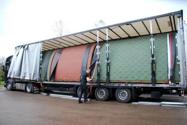Wooden camping pod, camping pods loaded on a transport truck