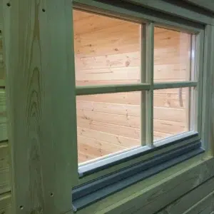 Wooden camping pod, close-up of an exterior window
