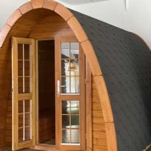 Wooden camping pod, close-up of glazed double doors