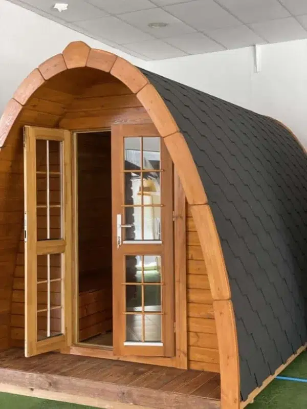 Wooden camping pod, close-up of glazed double doors