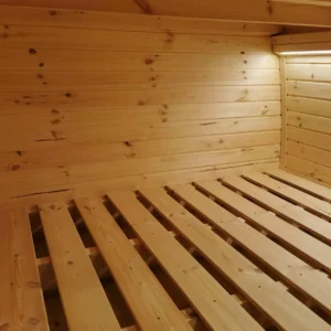 Wooden camping pod, close-up of slatted sleeping platform