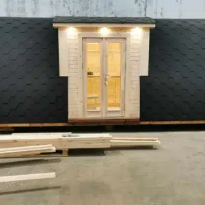 Wooden camping pod, closed side entrance with exterior lights