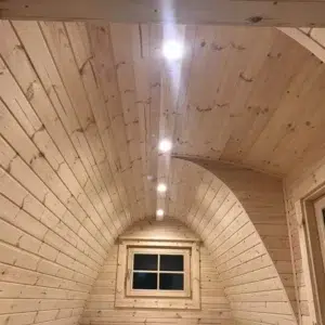 Wooden camping pod, curved wooden ceiling with recessed lights