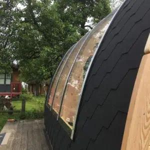 Wooden camping pod, exterior roof glazing detail