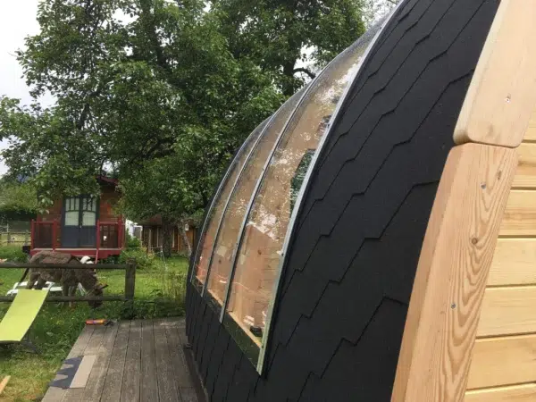 Wooden camping pod, exterior roof glazing detail