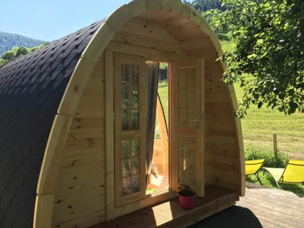 Wooden camping pod, front entrance with glazed double doors