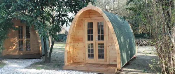 Wooden camping pod, front exterior with glazed double doors