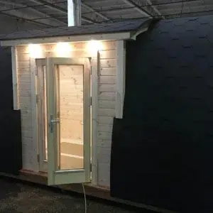 Wooden camping pod, illuminated side entrance and double doors