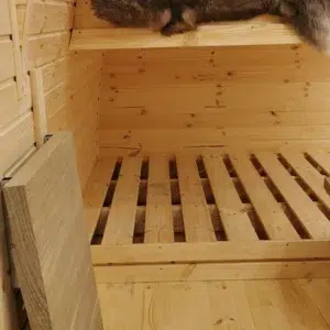 Wooden camping pod, lower slatted sleeping platform