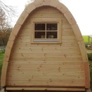 Wooden camping pod, rear exterior with small window
