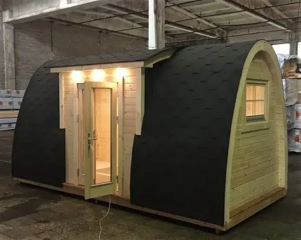 Wooden camping pod, side entrance with projecting canopy