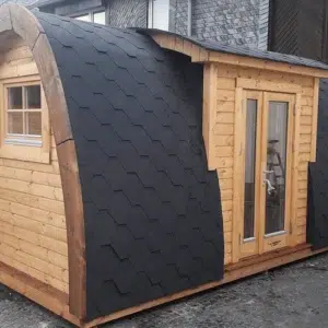 Wooden camping pod, side exterior with projecting entrance