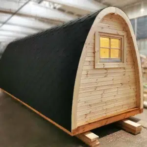 Wooden camping pod, side and rear exterior with rectangular window