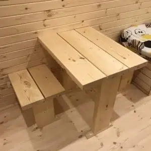 Wooden camping pod, wooden table and stools