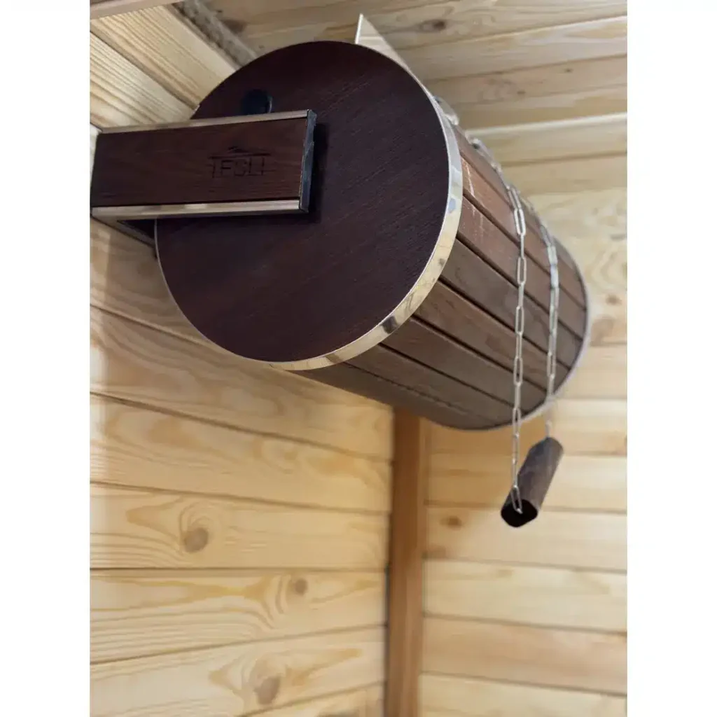 TESLI 20 L thermo basswood sauna shower cylinder with stainless steel insert, side view installed on a wooden wall